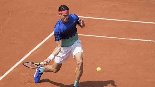 May 27, 2016; Paris, France; Milos Raonic (CAN) in action during his match against Andrej Martin (SVK) on day six of the 2016 French Open. Mandatory Credit: Susan Mullane-USA TODAY Sports
